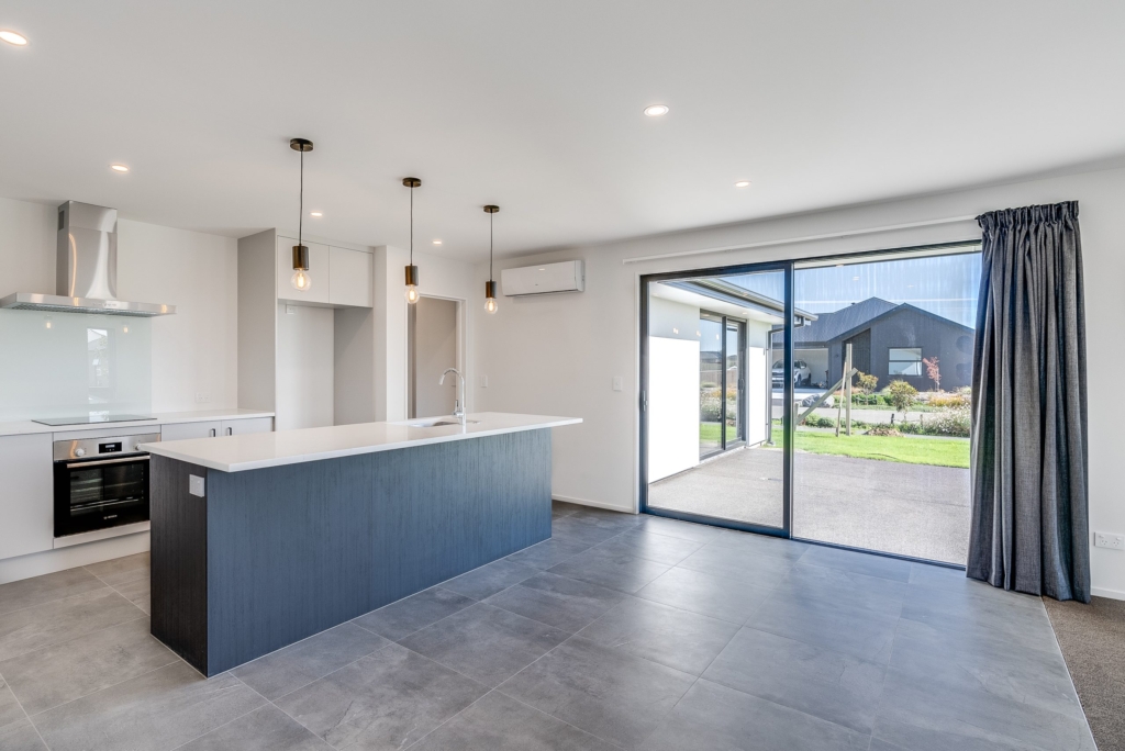 Living area in 5-bedroom 4-bathroom custom home at Nancy Wake Street, Rolleston