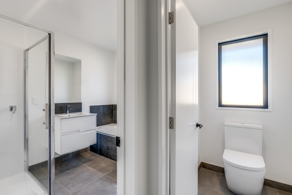 Bathroom in 5-bedroom 4-bathroom custom home at Nancy Wake Street, Rolleston
