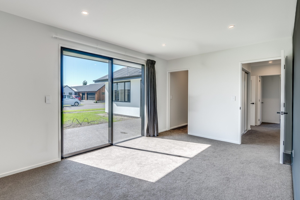 Bedroom in 5-bedroom 4-bathroom custom home at Nancy Wake Street, Rolleston