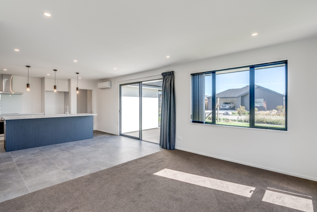 Living area in 5-bedroom 4-bathroom custom home at Nancy Wake Street, Rolleston