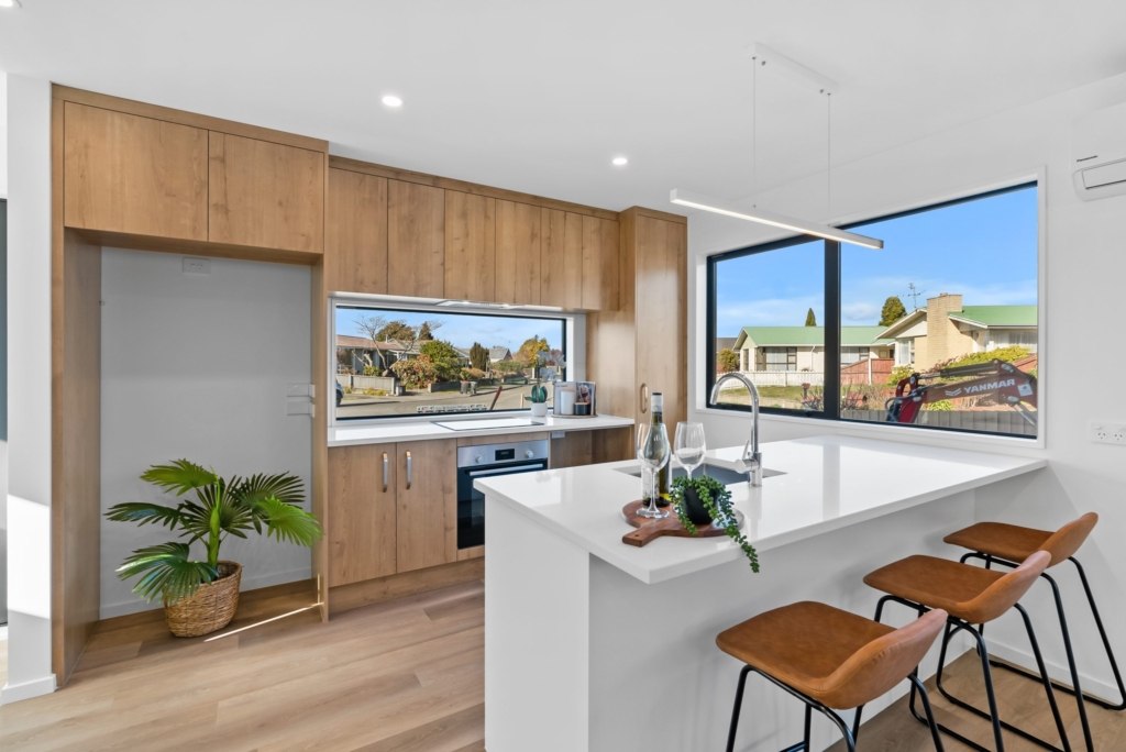 Kitchen in 3-bedroom 4-unit townhouse development at Dunluce Place, Hornby