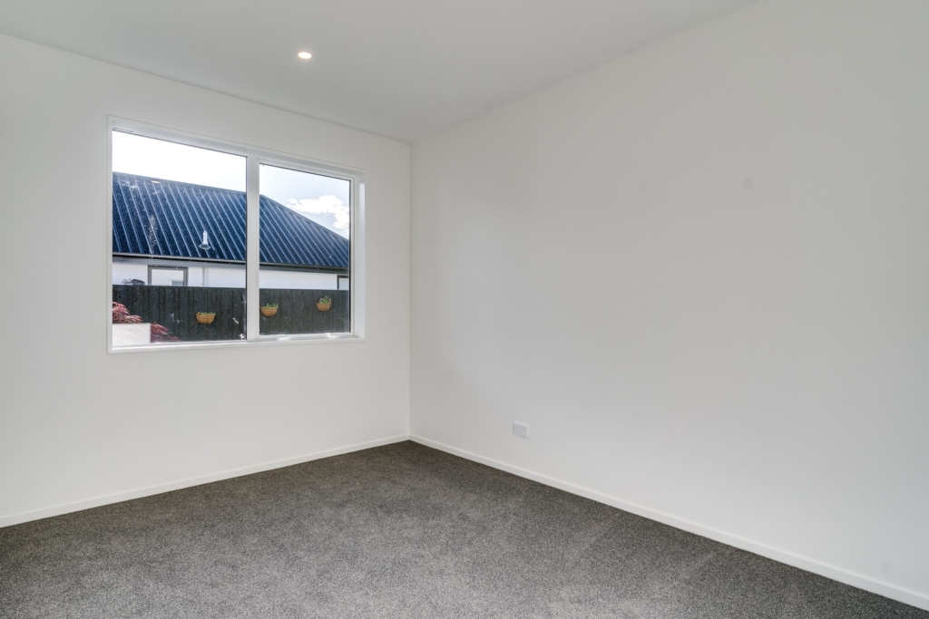 Bedroom in 4-bedroom 4-bathroom custom home at Irvines Track, Halswell
