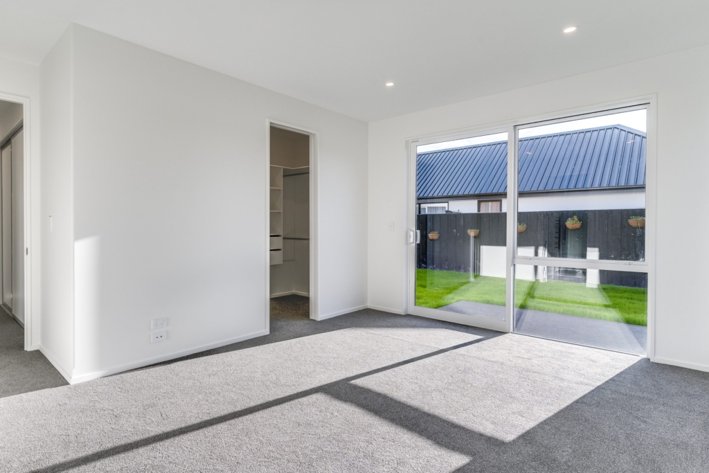 Bedroom in 4-bedroom 4-bathroom custom home at Irvines Track, Halswell