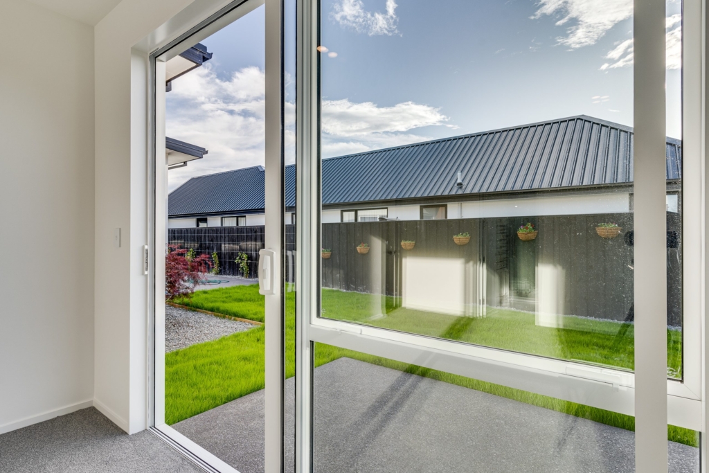 Exterior of 4-bedroom 4-bathroom custom home at Irvines Track, Halswell