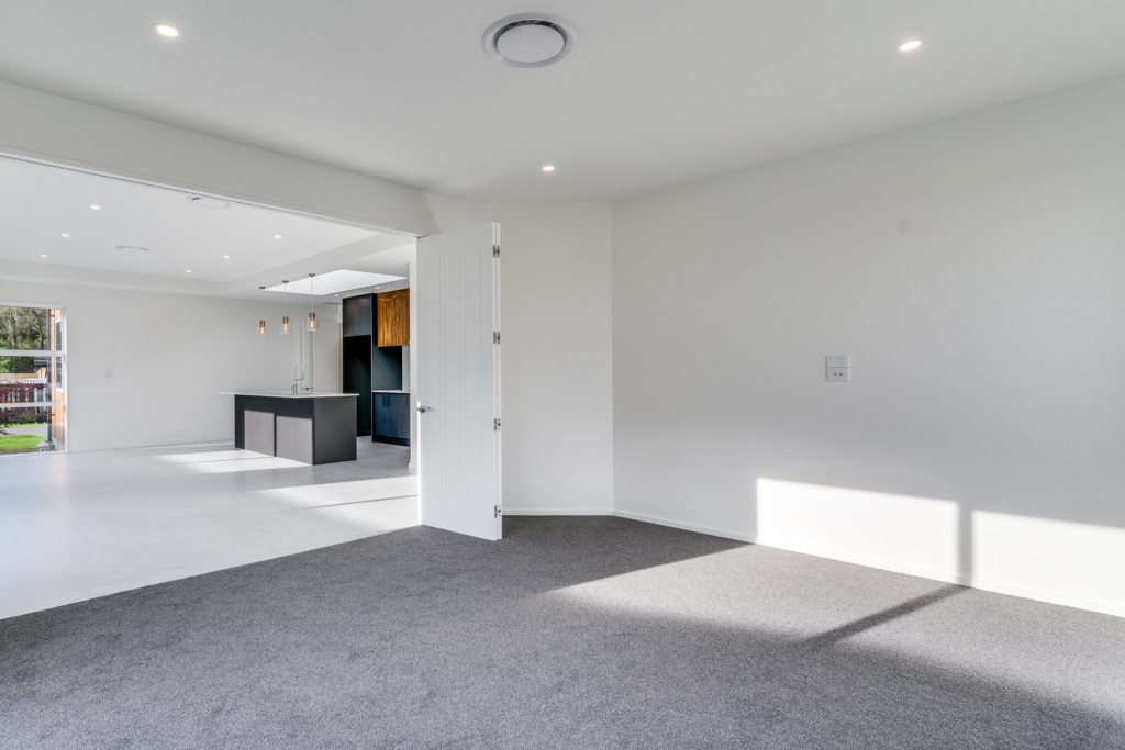 Living area in 4-bedroom 4-bathroom custom home at Irvines Track, Halswell