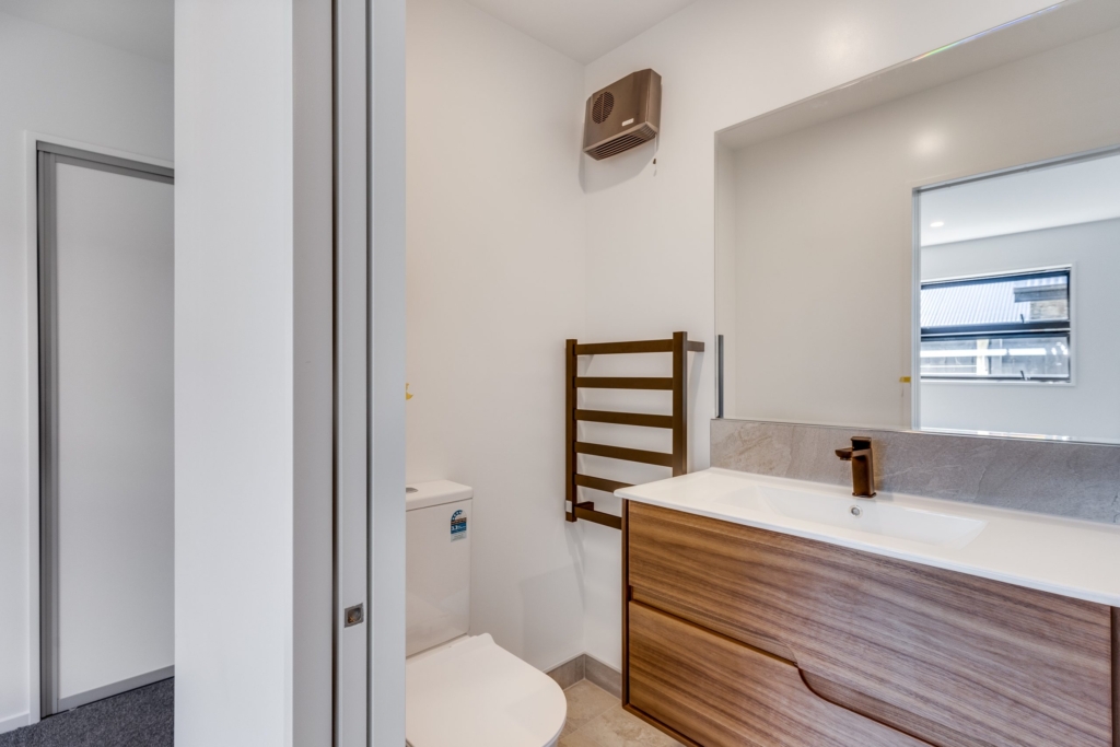 Bathroom in 3-bedroom 2-bathroom custom home at Irvines Track, Halswell