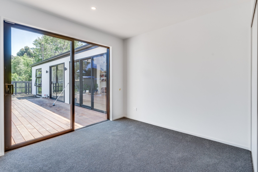 Bedroom in 3-bedroom 2-bathroom custom home at Irvines Track, Halswell