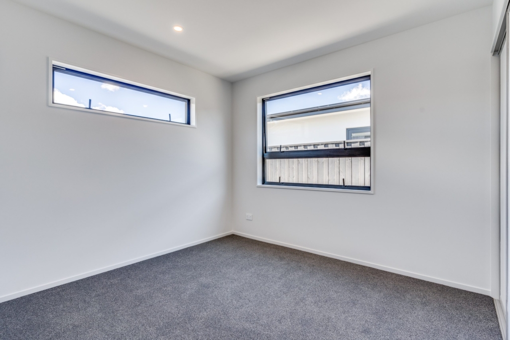 Bedroom in 3-bedroom 2-bathroom custom home at Irvines Track, Halswell