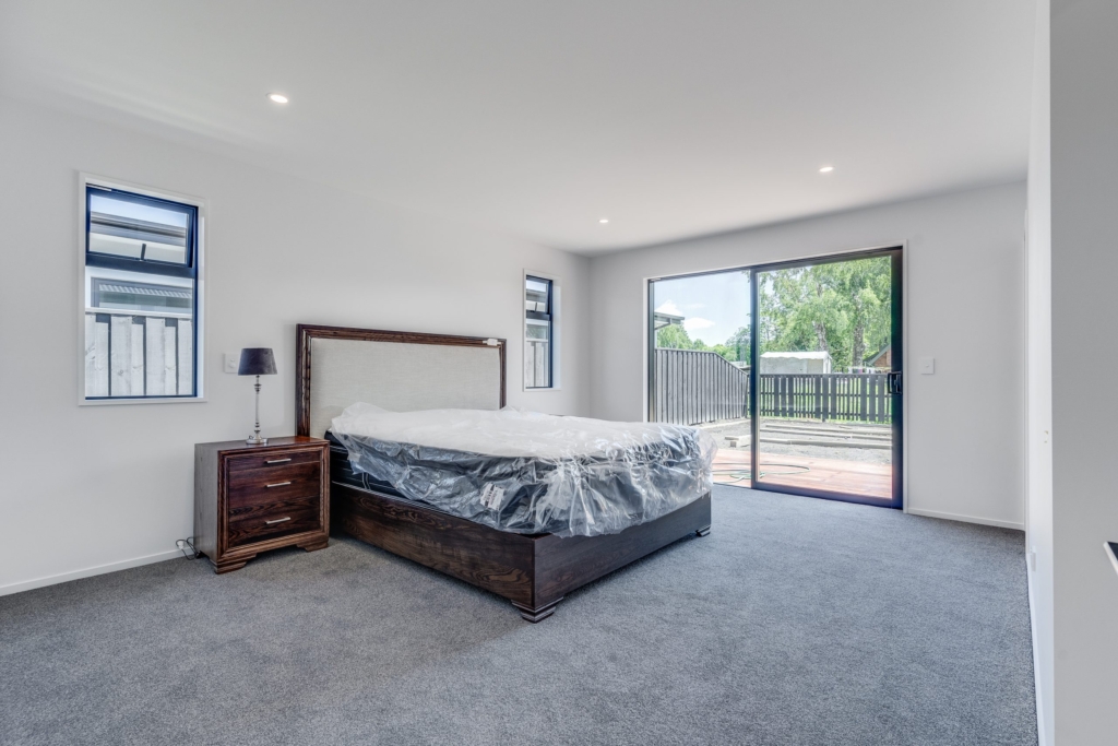 Bedroom in 3-bedroom 2-bathroom custom home at Irvines Track, Halswell