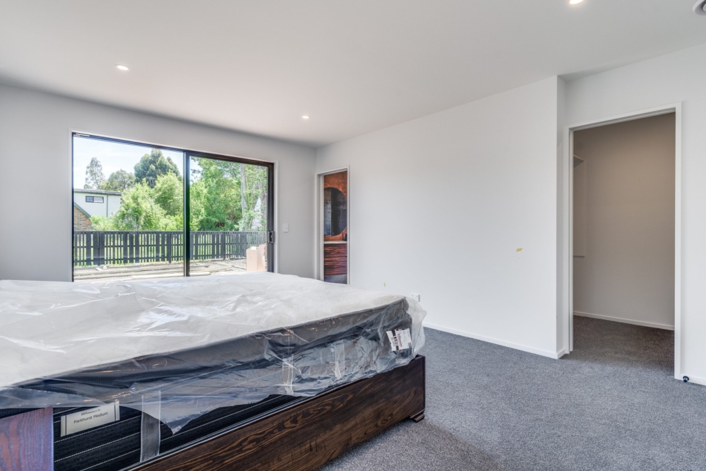 Bedroom in 3-bedroom 2-bathroom custom home at Irvines Track, Halswell