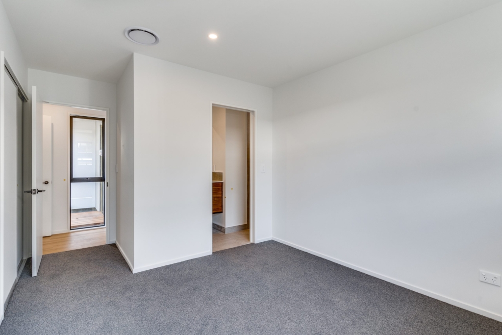 Bedroom in 3-bedroom 2-bathroom custom home at Irvines Track, Halswell