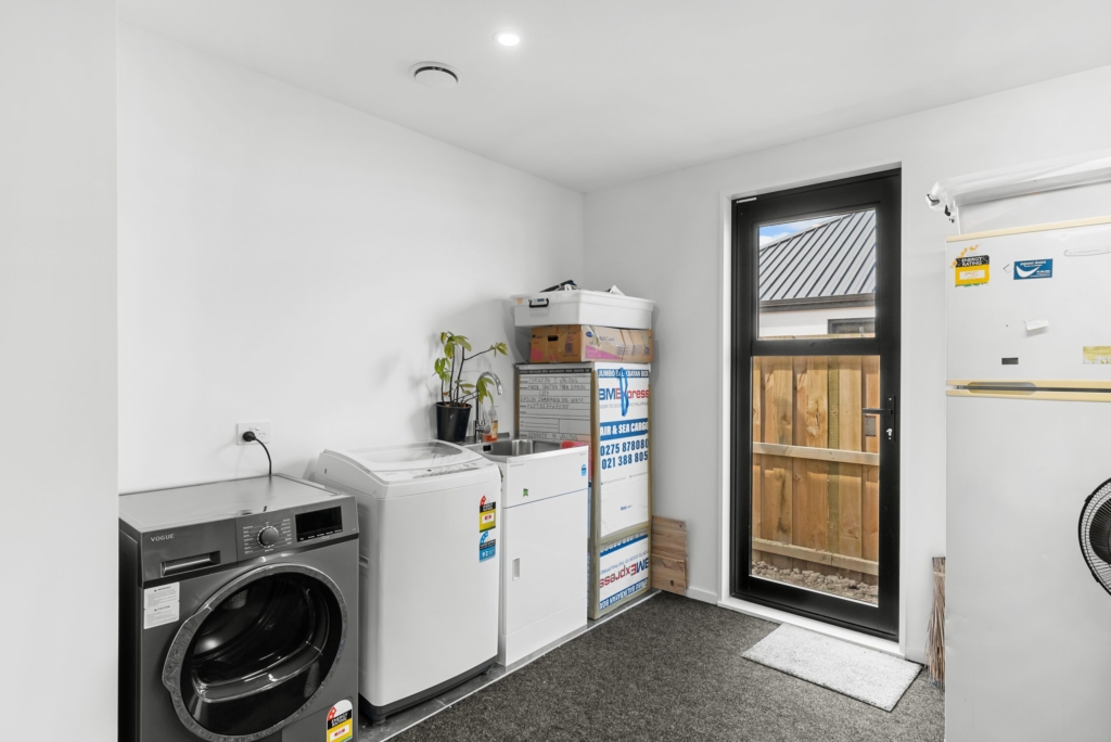 Garage of 4-bedroom 2-bathroom custom home at Larissa Road, Halswell