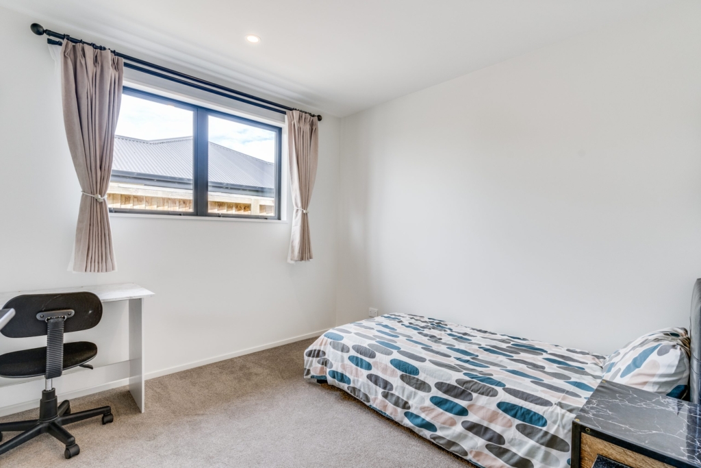 Bedroom in 4-bedroom 2-bathroom custom home at Whitburn Avenue, Halswell