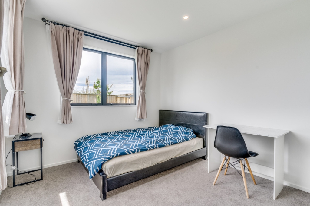Bedroom in 4-bedroom 2-bathroom custom home at Whitburn Avenue, Halswell