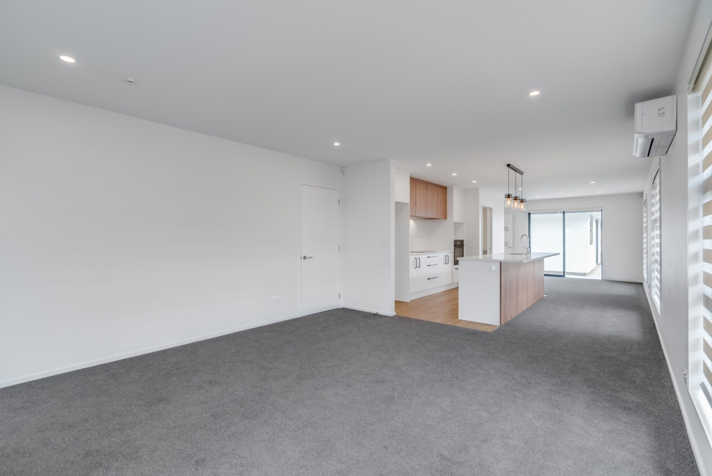 Living area in 3-bedroom 3-bathroom custom home at Nancy Wake Street, Rolleston