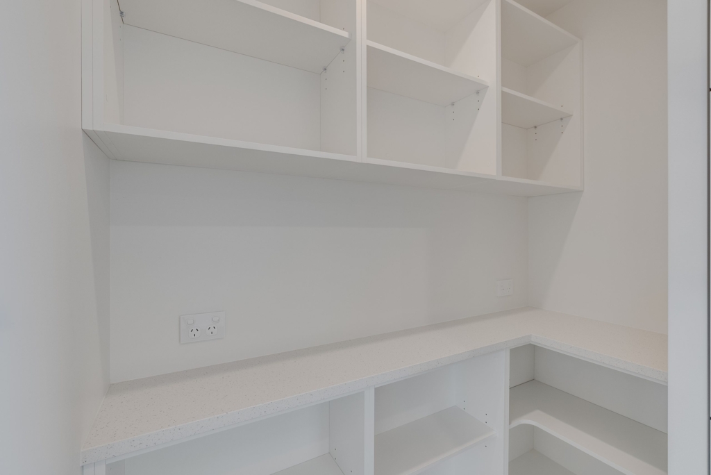Kitchen in 3-bedroom 3-bathroom custom home at Nancy Wake Street, Rolleston