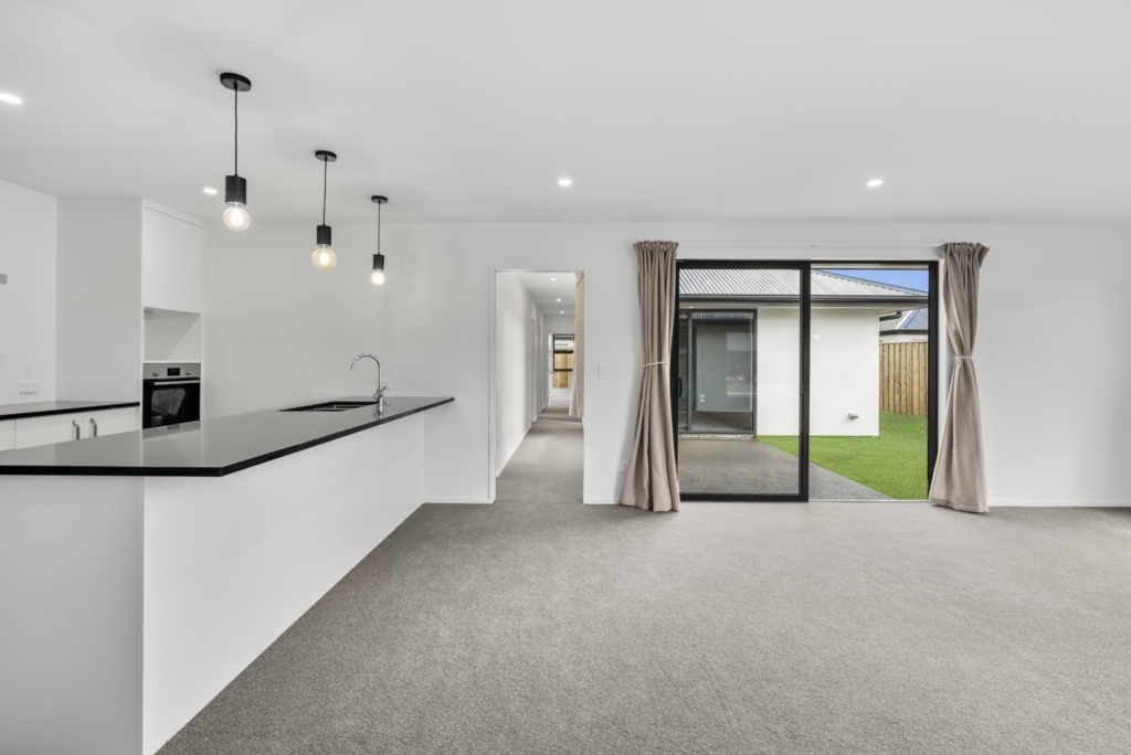 Living area in 3-bedroom 2-bathroom custom home at Kannedys landing, Halswell