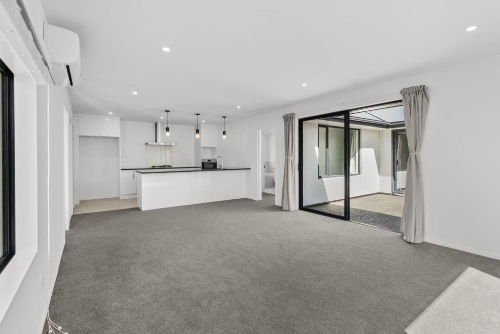 Living area in 3-bedroom 2-bathroom custom home at Kannedys landing, Halswell