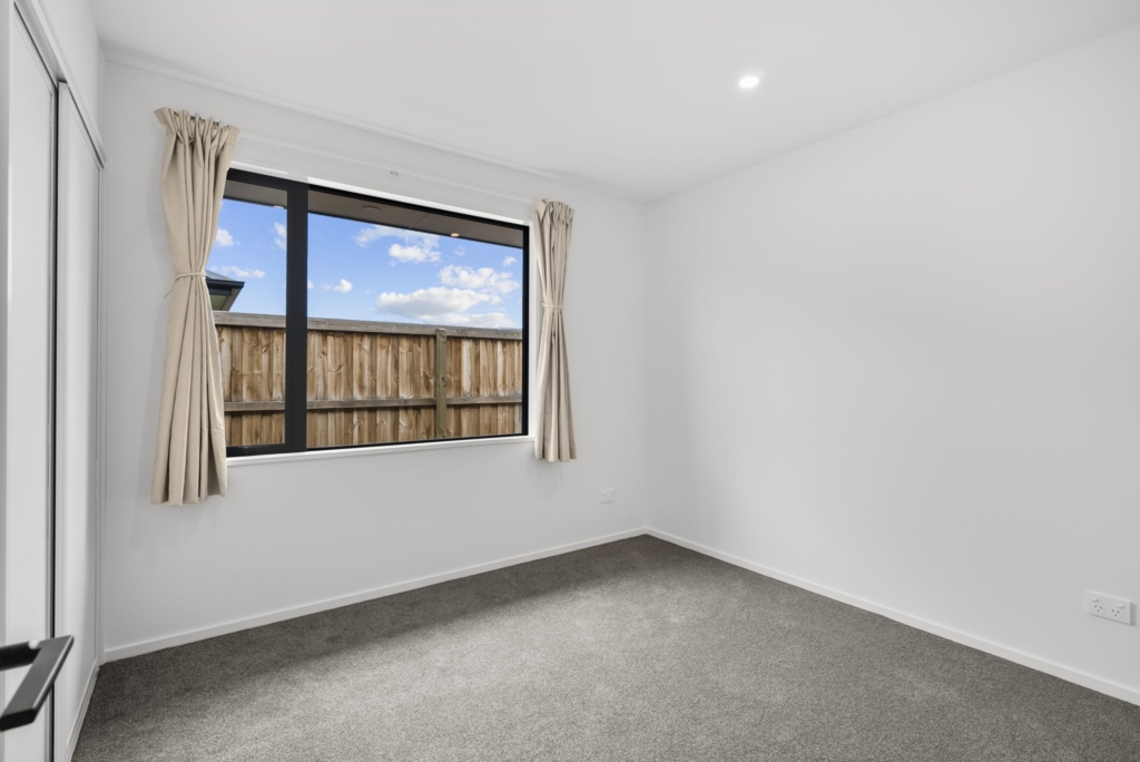 Bedroom in 3-bedroom 2-bathroom custom home at Kannedys landing, Halswell