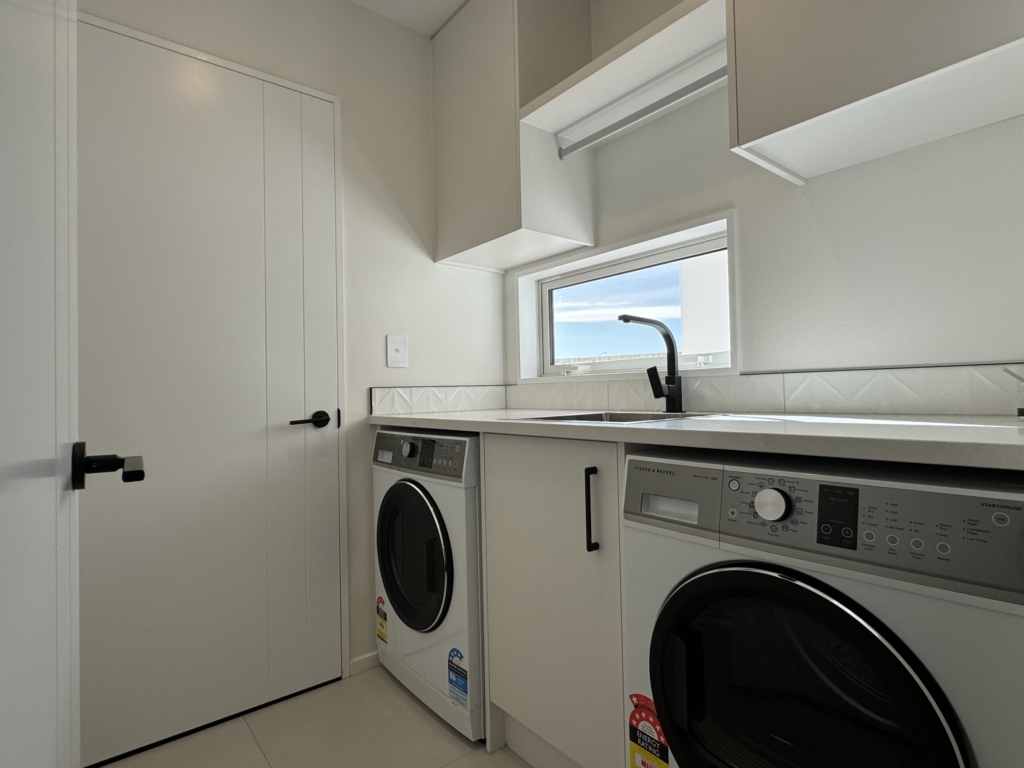 Garage of 3-bedroom 3-bathroom custom home at Acland Park, Rolleston