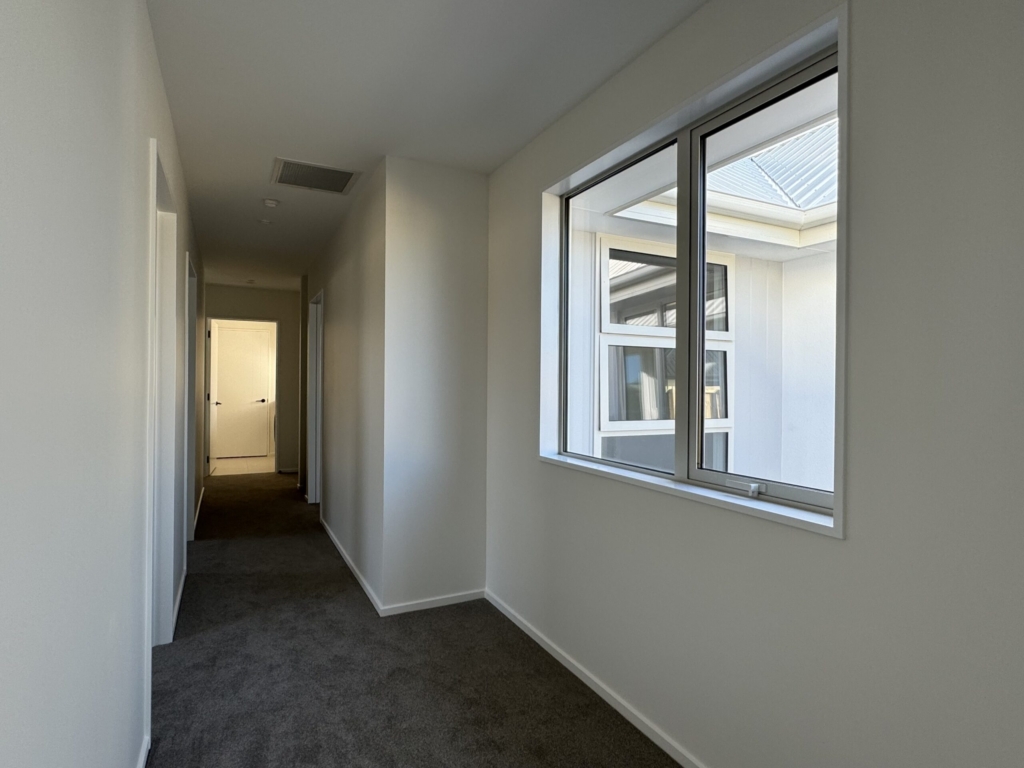Bedroom in 3-bedroom 3-bathroom custom home at Acland Park, Rolleston