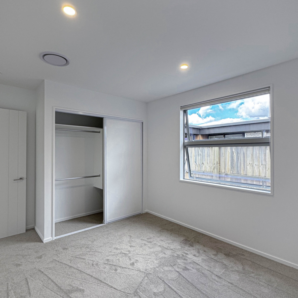 Bedroom in 5-bedroom 3-bathroom custom home at Storr Close, Halswell