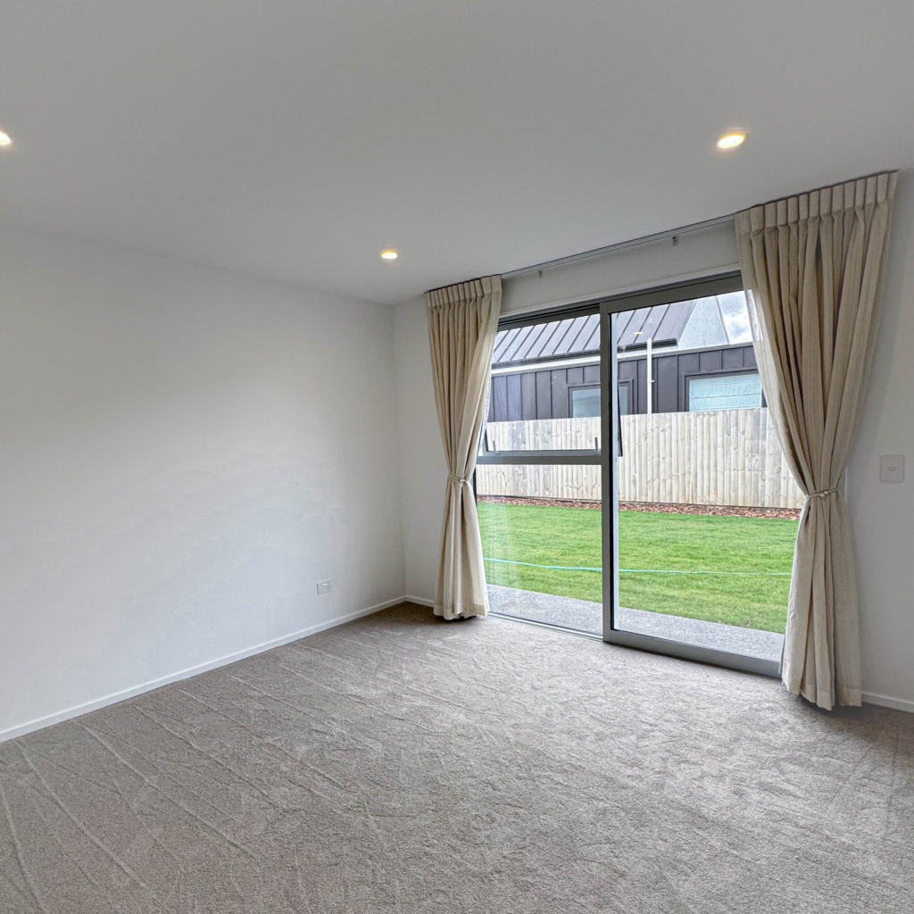 Bedroom in 5-bedroom 3-bathroom custom home at Storr Close, Halswell