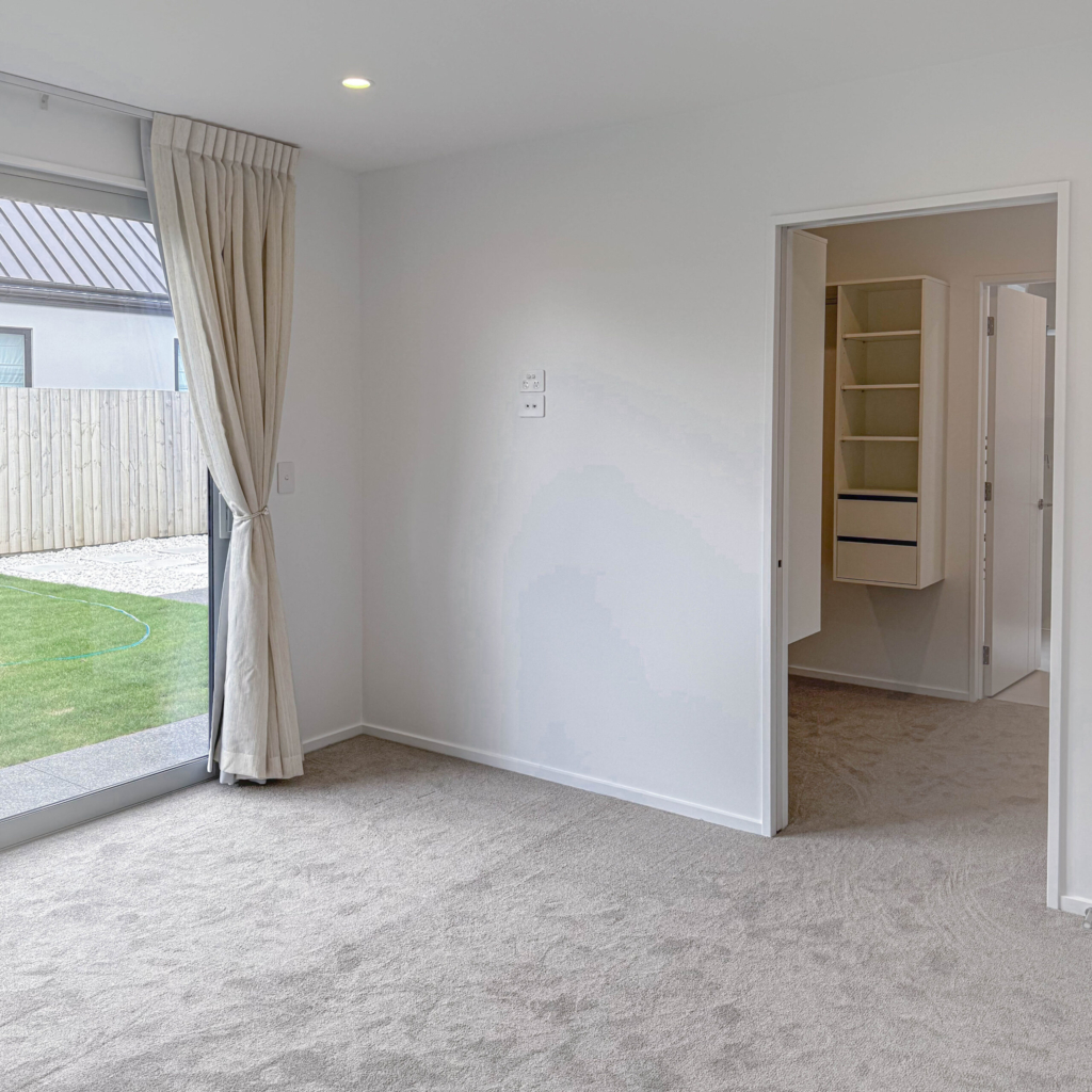 Bedroom in 5-bedroom 3-bathroom custom home at Storr Close, Halswell