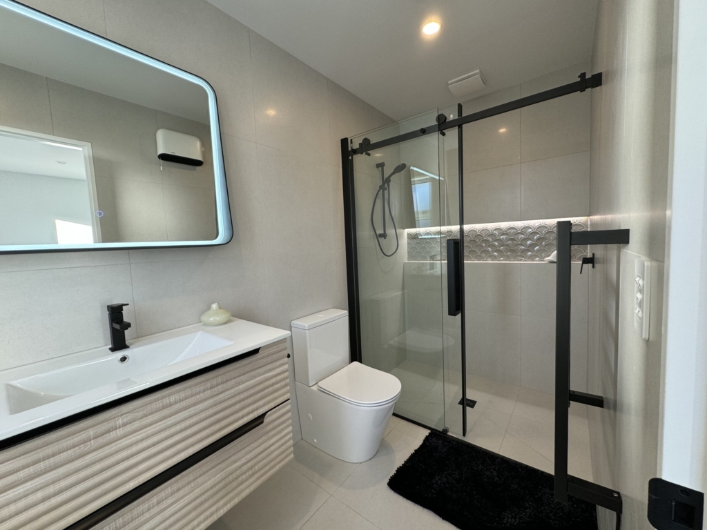 Bathroom in 3-bedroom 3-bathroom custom home at Kannedys landing, Halswell