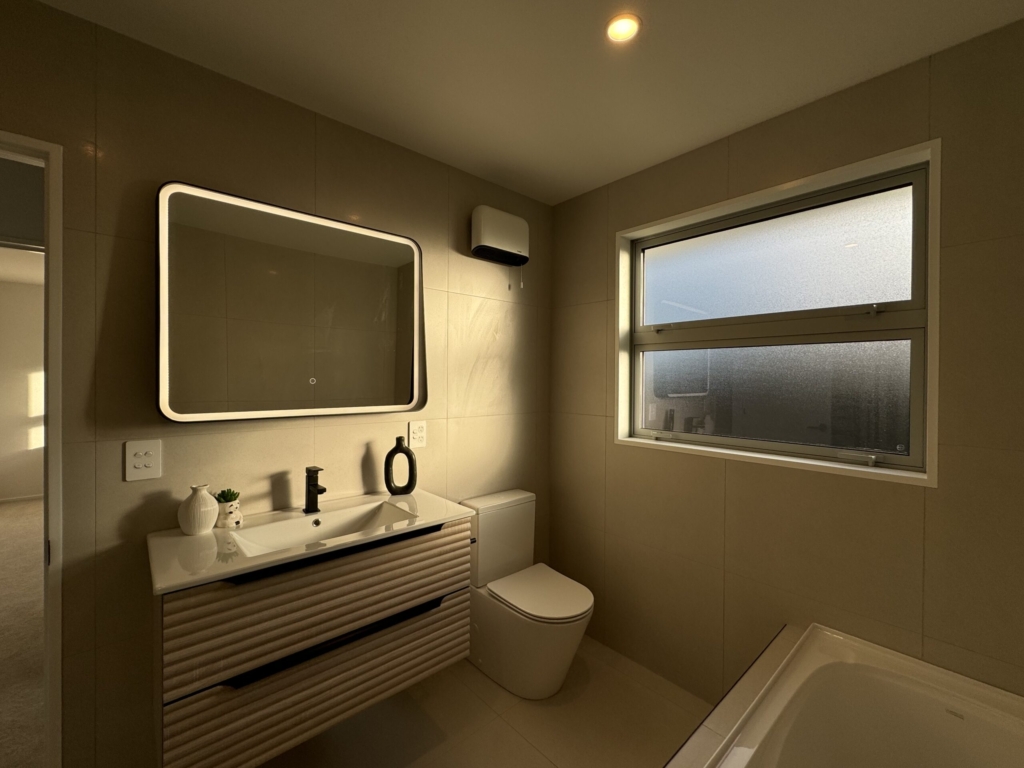 Bathroom in 3-bedroom 3-bathroom custom home at Kannedys landing, Halswell