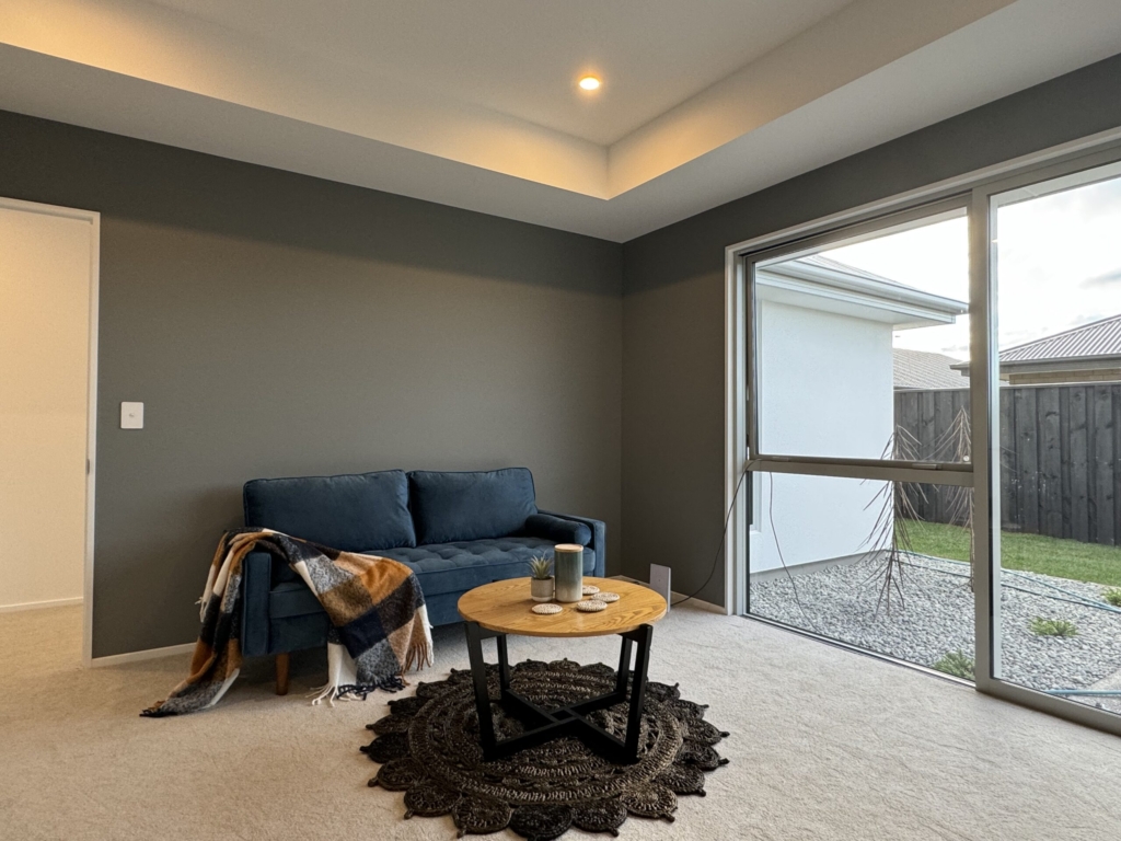 Living area in 3-bedroom 3-bathroom custom home at Kannedys landing, Halswell
