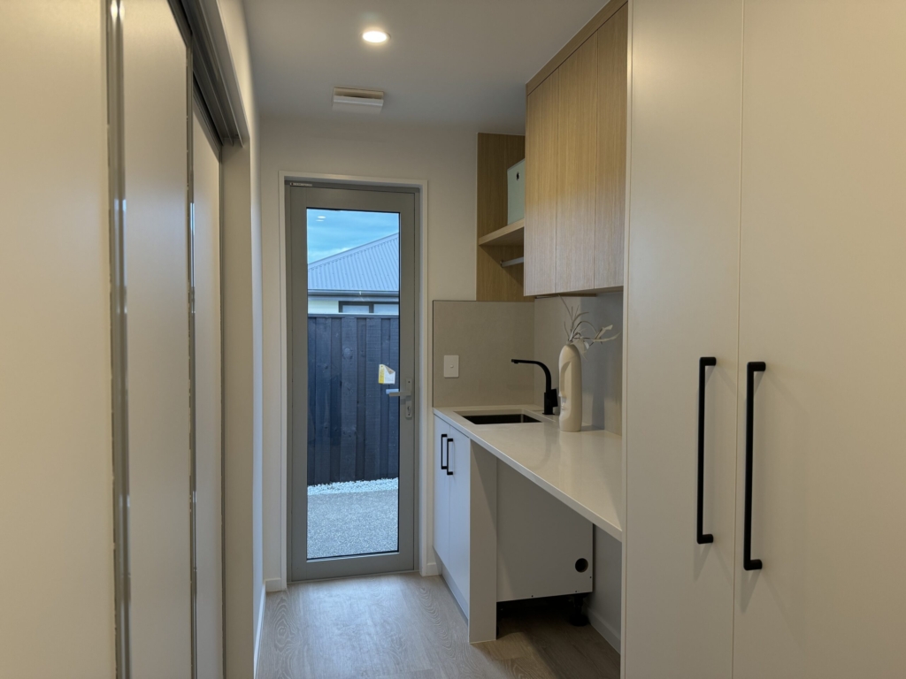 Garage of 3-bedroom 3-bathroom custom home at Kannedys landing, Halswell