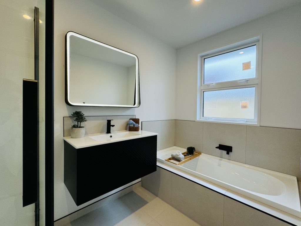 Bathroom in 4-bedroom 2-bathroom custom home at Kannedys landing, Halswell
