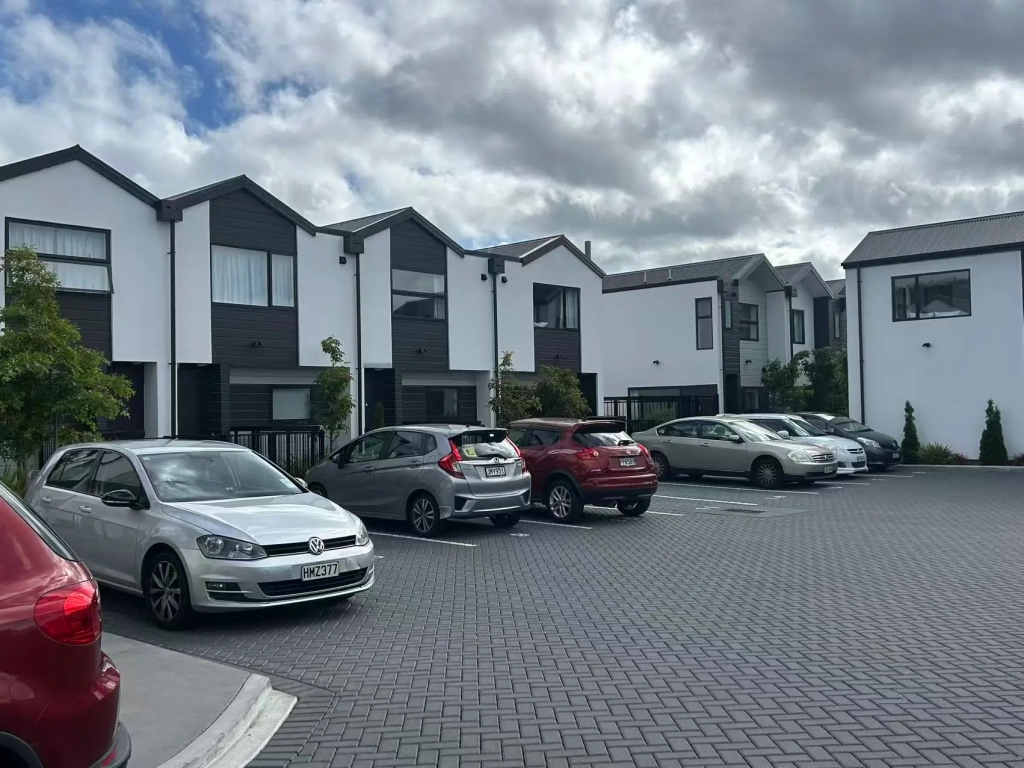 Exterior of 2-bedroom 21-unit townhouse development at Bunyan Street, Waltham
