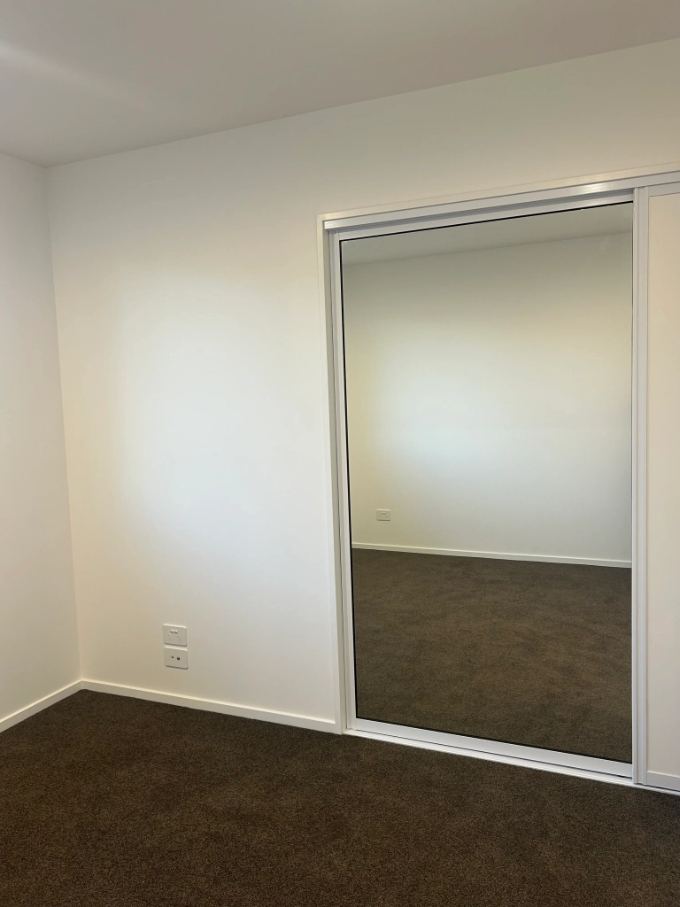 Bedroom in 3-bedroom 2-bathroom custom home at Gardiners Road, Harewood