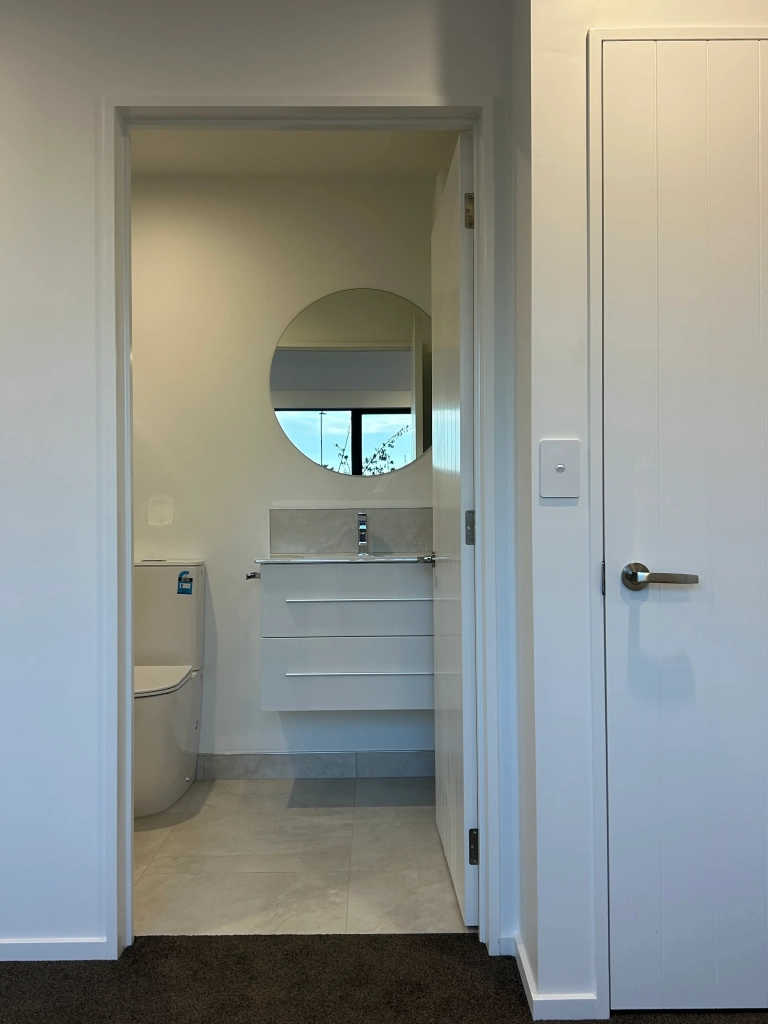 Bedroom in 3-bedroom 2-bathroom custom home at Gardiners Road, Harewood