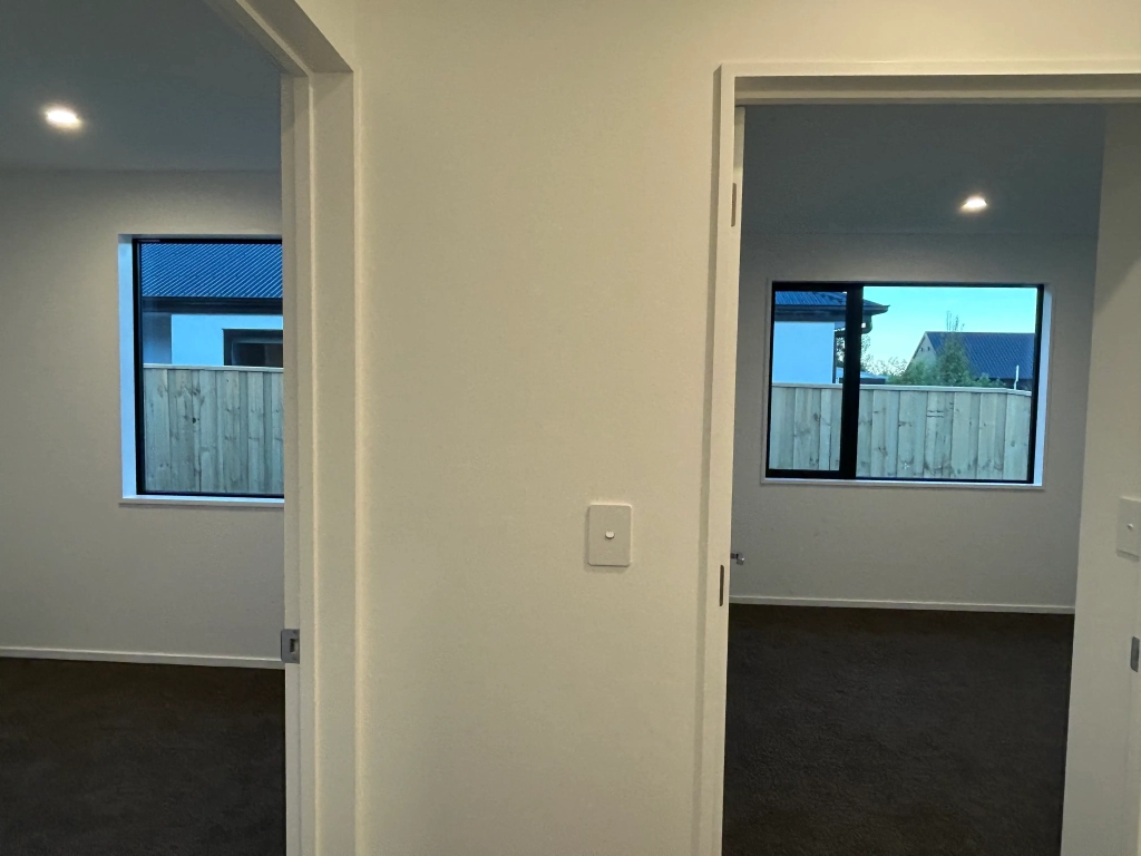 Bedroom in 3-bedroom 2-bathroom custom home at Gardiners Road, Harewood