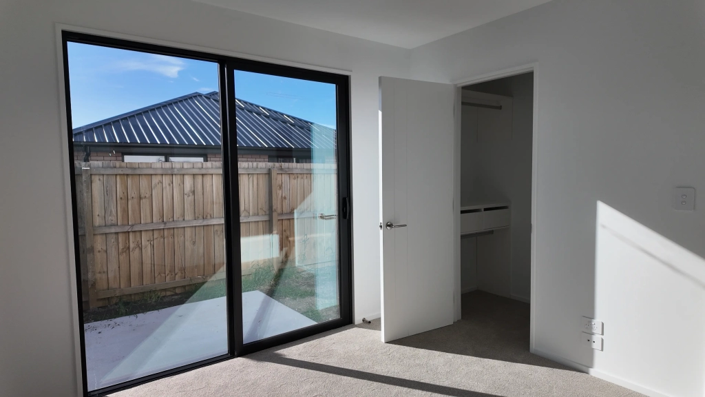 Bedroom in 3-bedroom 6-unit townhouse development at Bernina Lane, Wigram
