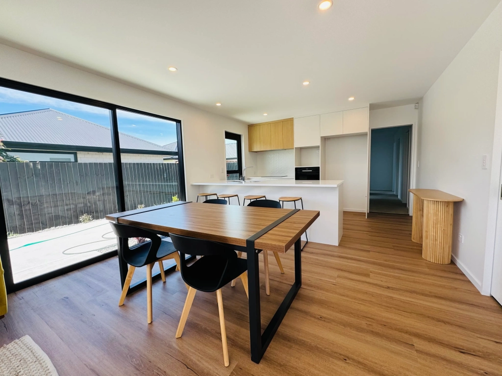 Kitchen in 3-bedroom 6-unit townhouse development at Bernina Lane, Wigram
