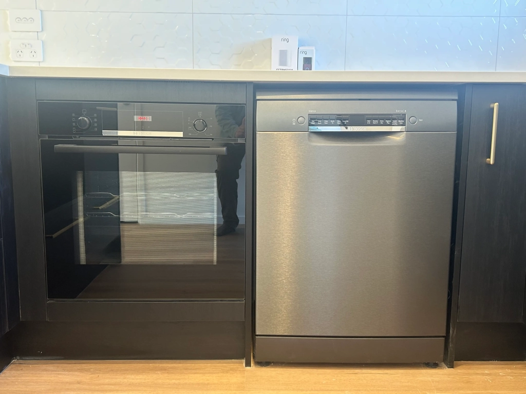 Kitchen in 2-bedroom 15-unit townhouse development at Deal Street, Wigram