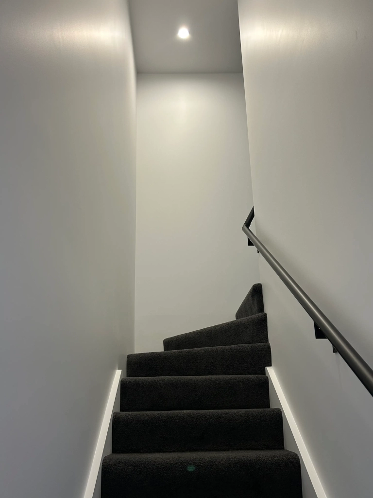Living area in 2-bedroom 26-unit townhouse development at Boardway Parade, Rolleston