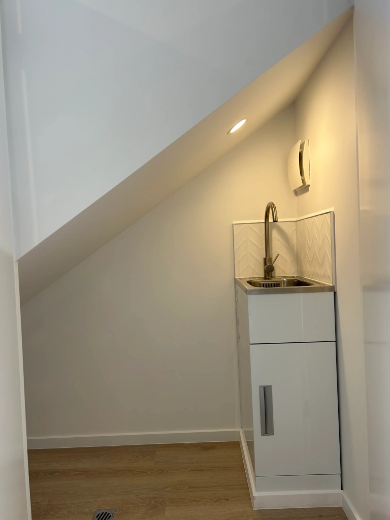 Living area in 2-bedroom 26-unit townhouse development at Boardway Parade, Rolleston
