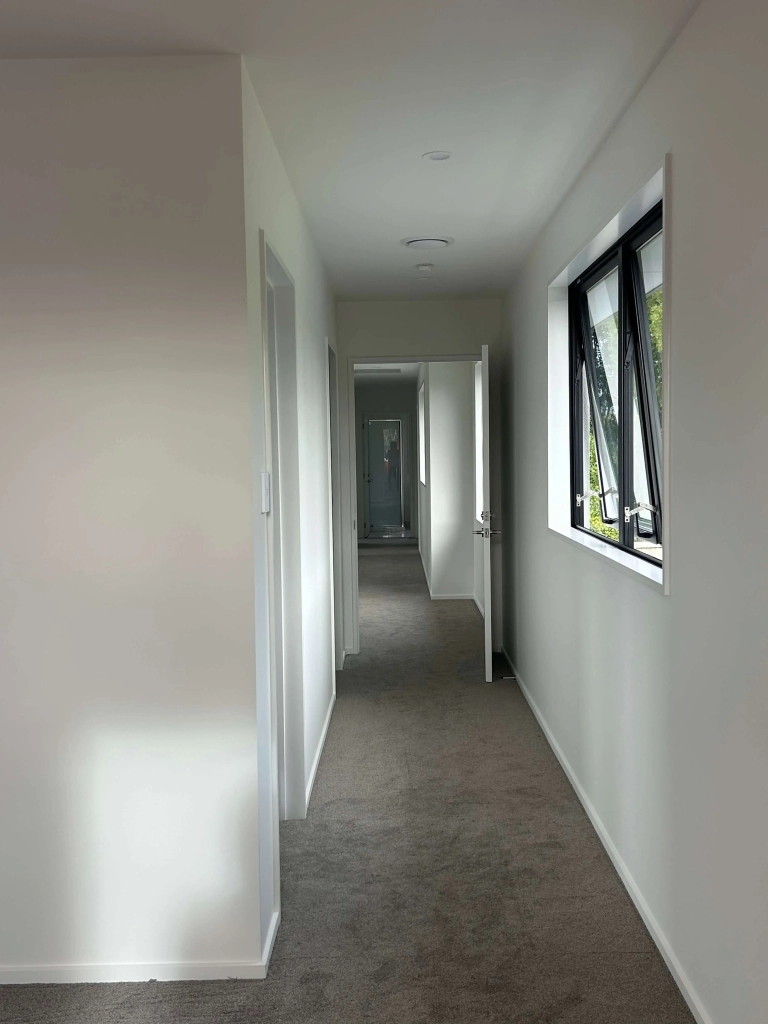 Living area in 4-bedroom 2-bathroom custom home at Karo Place, Ilam
