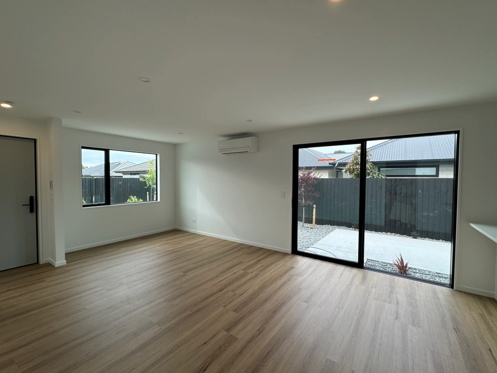 Living area in 3-bedroom 6-unit townhouse development at Bernina Lane, Wigram