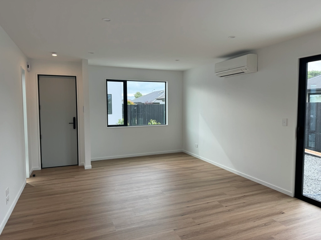 Living area in 3-bedroom 6-unit townhouse development at Bernina Lane, Wigram