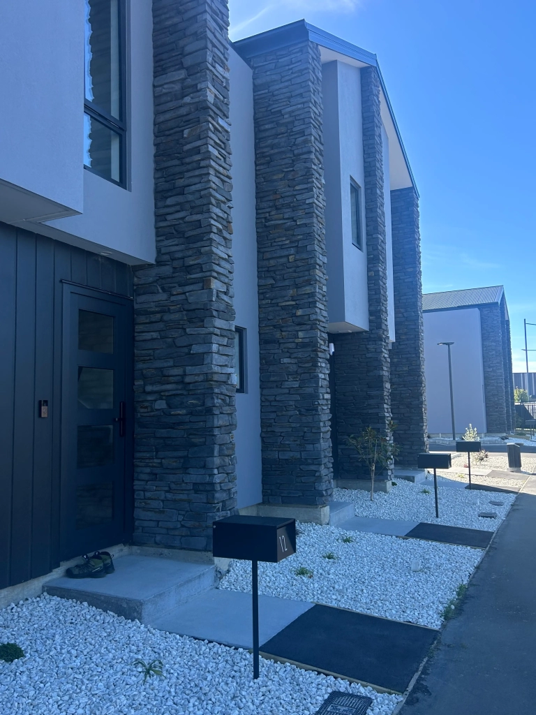 Exterior of 2-bedroom 15-unit townhouse development at Deal Street, Wigram
